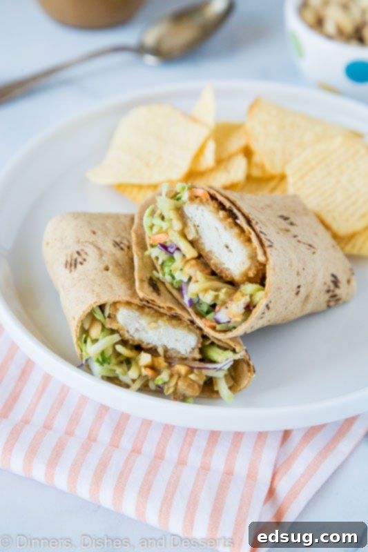 Flavorful Asian Chicken Lettuce Wraps 5 Asian chicken wrap with thai peanut sauce, ready to be served.