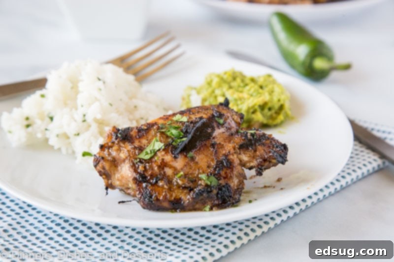 Fiery Jamaican Jerk Chicken 5 Horizontal shot of grilled jerk chicken with a vibrant marinade