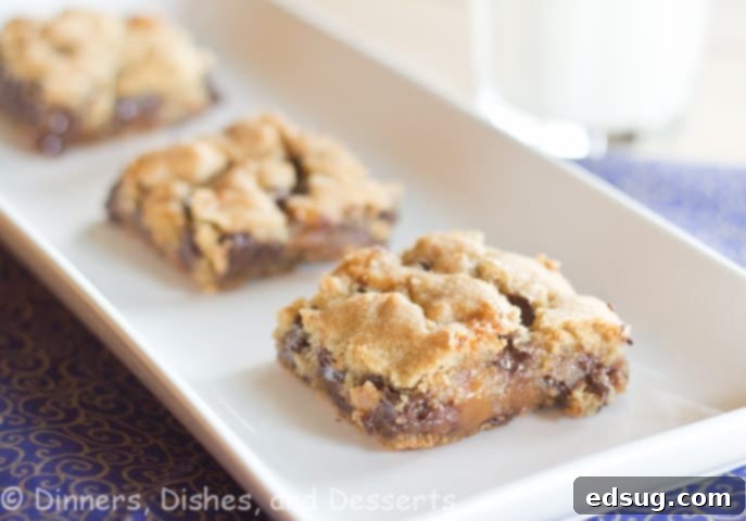 Biscoff Caramel Cookie Bar sliced to show caramel layer