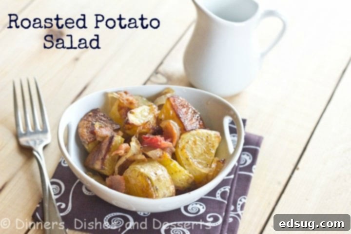 roasted potato salad with caramelized onions and bacon in a bowl