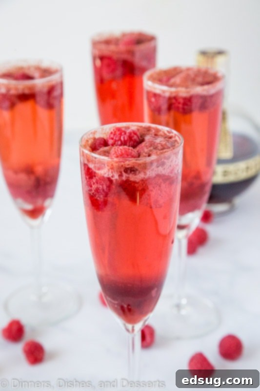 Raspberry Mimosas with chambord, champagne and raspberry sorbet