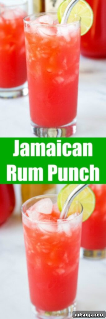 Reggae Rhythm Rum Punch 6 A vibrant glass of Jamaican Rum Punch garnished with fresh lime and orange slices, set against a tropical backdrop, inviting a refreshing sip.