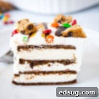 A close up of a slice of cake on a plate, with Cream