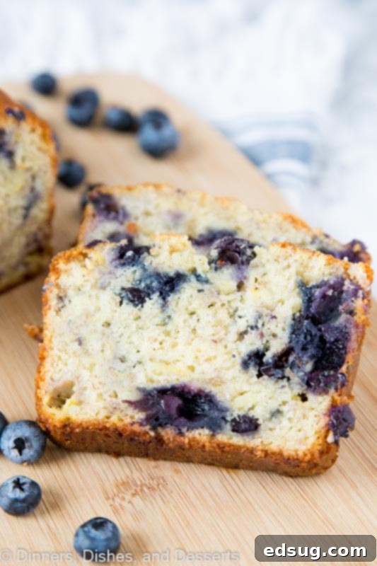 A beautifully baked loaf of blueberry banana bread, golden brown and enticing