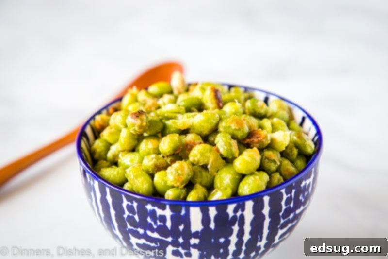 Crispy Garlic Parmesan Edamame 4 Parmesan Garlic Roasted Edamame - need a new way to get your kids to eat their vegetables? These soy beans are roasted until crispy and coated in Parmesan cheese. Great for picky eaters!Â