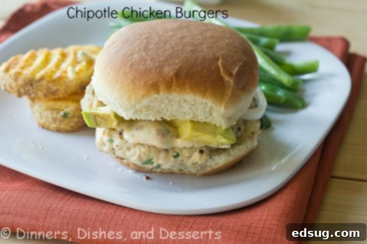Chipotle Chicken Burgers Delicious Chipotle Chicken Burgers served on buns with fresh toppings.