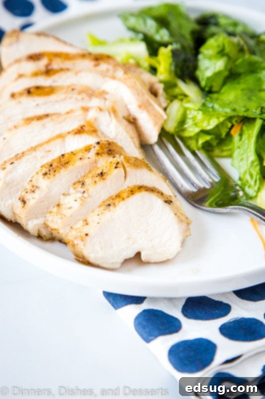 Ultimate Sous Vide Chicken Breast 3 Close-up of perfectly sliced sous vide chicken breast, showing its incredible juiciness.