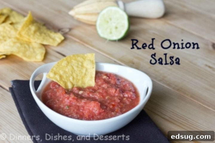 Red Onion Salsa ready to be served in a bowl with cilantro