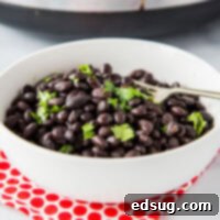 Effortless Slow Cooker Black Beans 6 A bowl of black beans on a plate