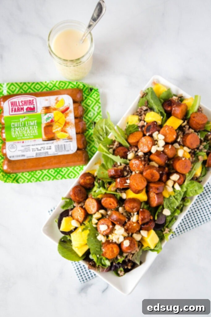Wild rice salad with mango, sausage, macadamia nuts and a creamy yogurt dressing