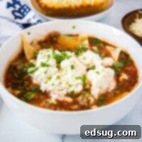 A bowl of soup on a plate