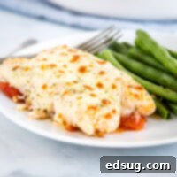 A plate of food on a table, with Chicken
