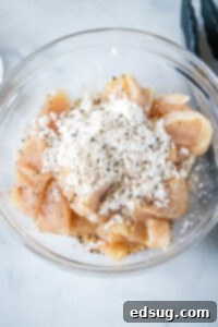 Fiery Chicken Stir Fry 9 adding cornstarch salt and pepper over chicken