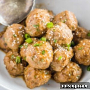 Sticky Hoisin Baked Turkey Meatballs 2 cropped in close up of a bowl of turkey meatballs