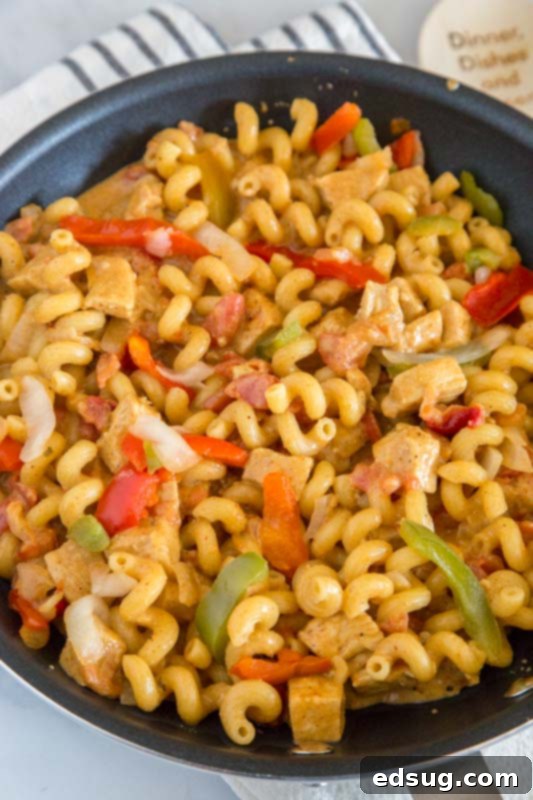 Delicious one-pot chicken fajita pasta ready in minutes for any weeknight meal!