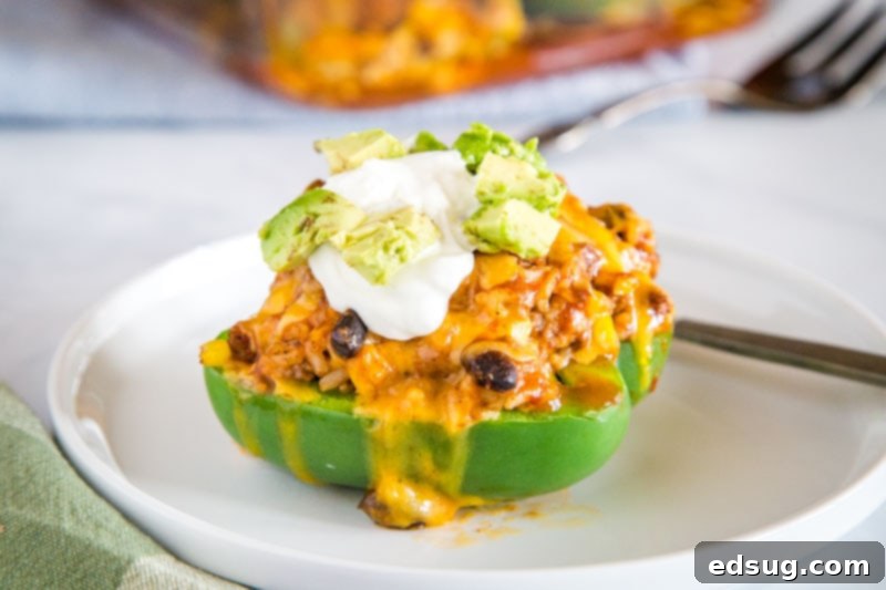 Close-up of a single easy taco stuffed pepper, perfectly baked and ready to eat.