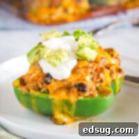 A plate of easy taco stuffed peppers on a serving dish.
