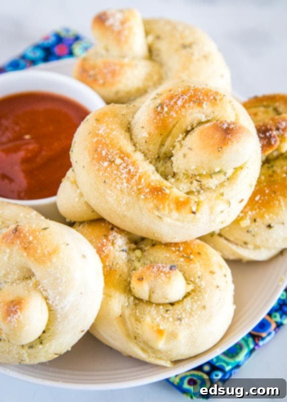 Garlic Knots that are easy to make and coated in a delicious butter garlic sauce