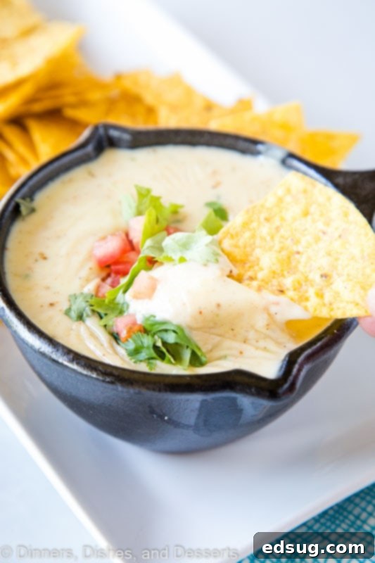 Creamy homemade White Queso dip, ready in minutes and perfect for any party or gathering.