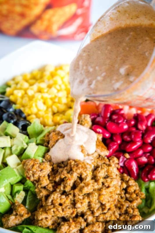 Dorito Fiesta Salad 3 Great potluck salad with leftover taco meat. Top with a salsa ranch dressing for a great salad