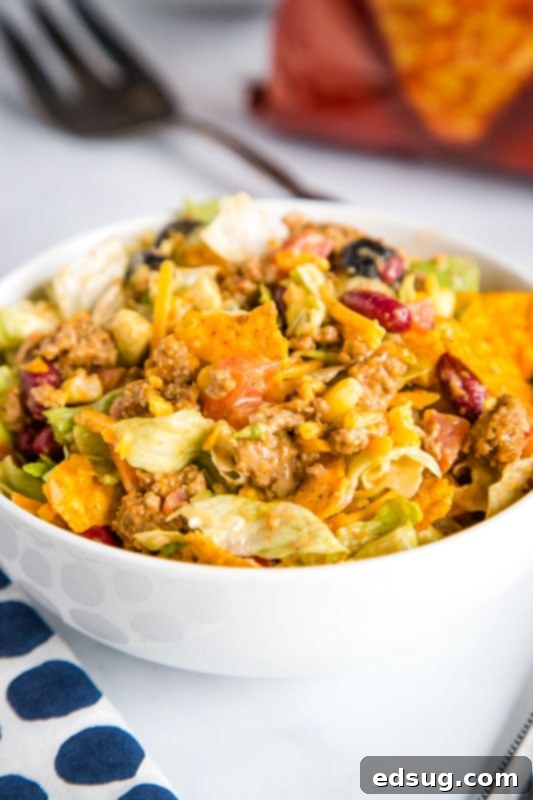 Dorito Fiesta Salad 4 Dorito Taco Salad is a great dinner, lunch or even potluck recipe