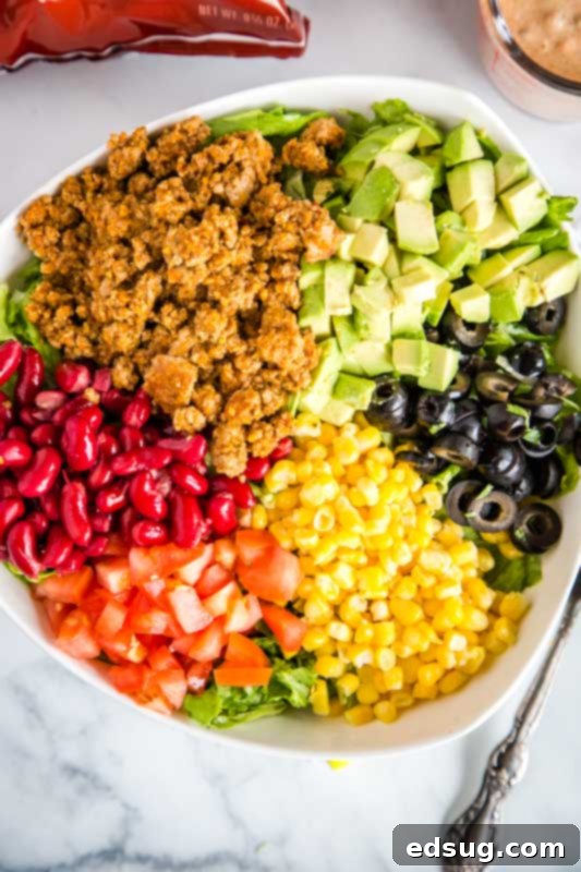 Dorito Fiesta Salad 5 Use taco meat and Doritos to make this salad over the top good.