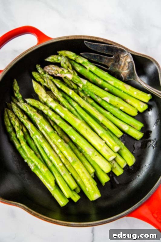 Asparagus is sauteed in butter and olive oil for a delicious and easy side dish