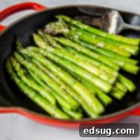 Sautéed Asparagus - super simple side dish with asparagus sautéed in butter, garlic and seasoned with salt and pepper. Ready in just minutes, healthy, and goes with just about everything.