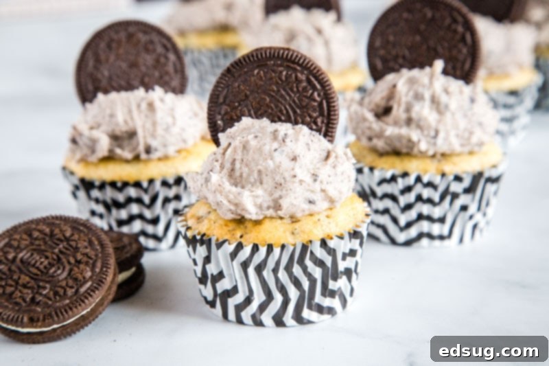 Oreo Delight Cupcakes 5 A close-up of a beautifully frosted Cookies and Cream Cupcake, ready to be enjoyed.
