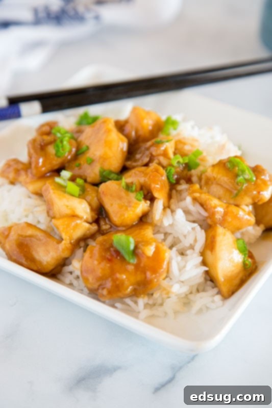 General Tso's Crispy Classic 4 A skillet filled with succulent General Tso chicken coated in rich, sweet, and spicy sauce, perfect for a quick weeknight meal.