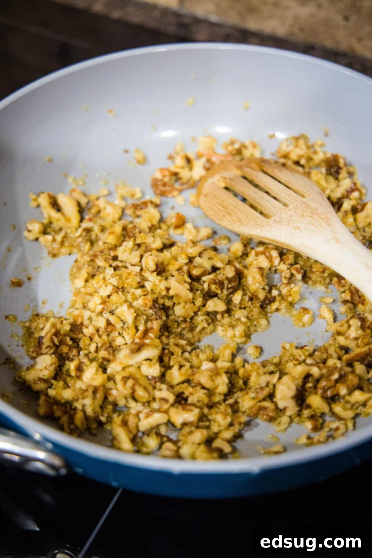This toasted walnut pasta is an easy, flavorful, and filling 15-minute pasta recipe with crunchy walnuts, breadcrumbs, garlic, and chili. Toasted walnuts, breadcrumbs, and red pepper flakes sizzling in a skillet with olive oil.