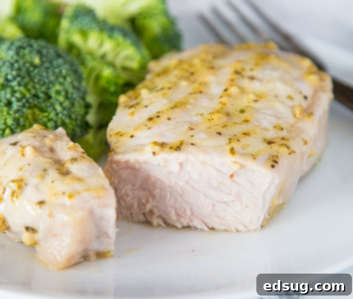 A close up of a plate of food with broccoli, with Pork