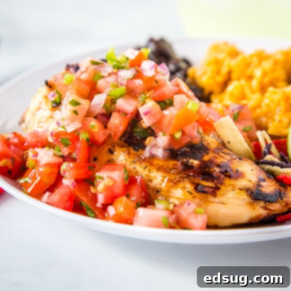 Flavorful Margarita Grilled Chicken, inspired by Chili's, topped with fresh pico de gallo.