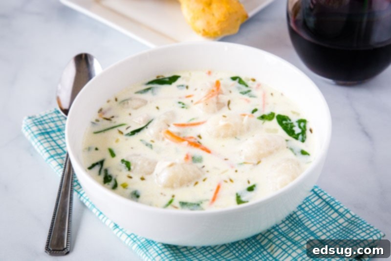 A warm and creamy bowl of Olive Garden Chicken Gnocchi Soup, a comforting and lightened-up version.
