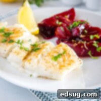 Easy Baked Cod with light seasoning and melted butter, served with Harvard Beets.