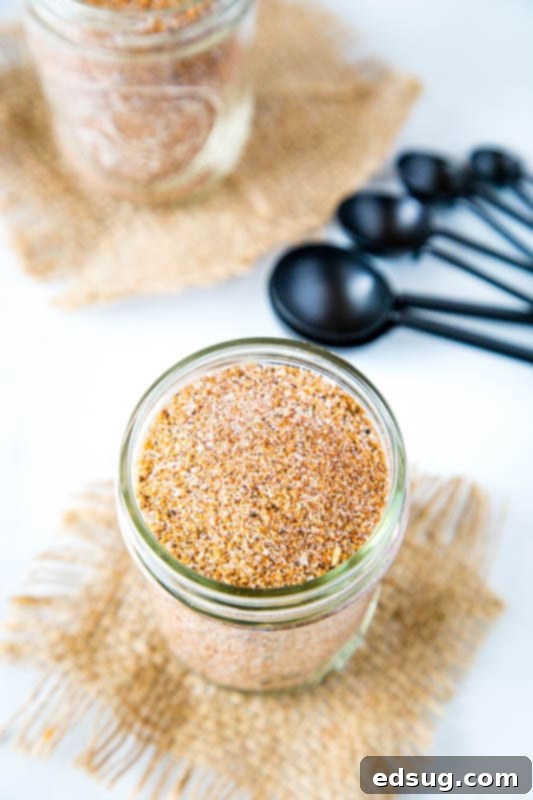 Best dry rub for pork ribs applied generously to a rack of ribs, ready for cooking