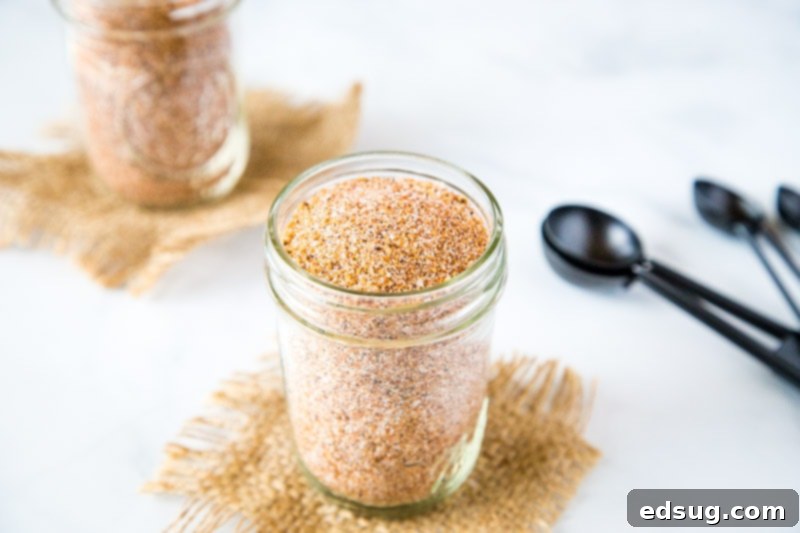 The best dry rub for ribs in a glass jar, ready for use, emphasizing homemade spice blend for smoking, grilling, or slow cooking.