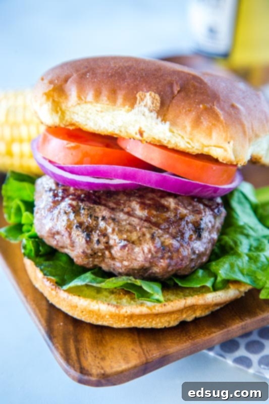 Thick and juicy grilled hamburgers on plate