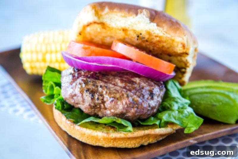 The Best Classic Hamburgers - homemade hamburgers are simple but absolutely delicious. Just a few staple ingredients and you have a thick and juicy burger that is perfect for any summer day!
