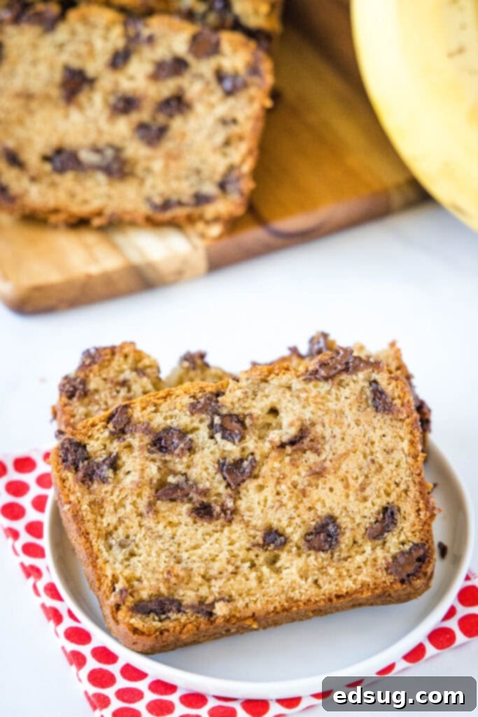 Ultimate Peanut Butter Banana Bread 5 slice of peanut butter banana bread on a white plate