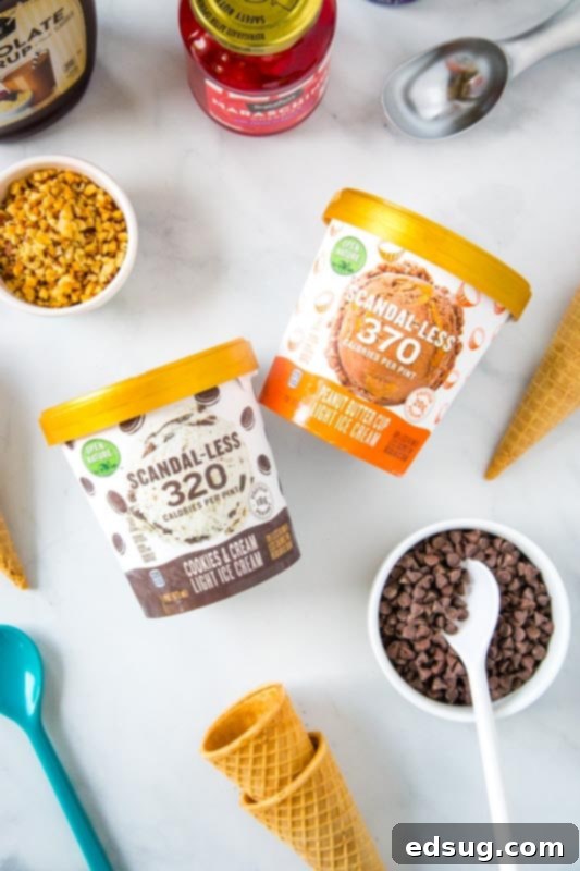 Build Your Own Sundae Bar 4 Ice cream sundae set up with ice cream in carton, chocolate chips, nuts, cherries, ice cream cones