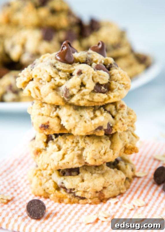 oatmeal chocolate chip cookies staked on striped napkin