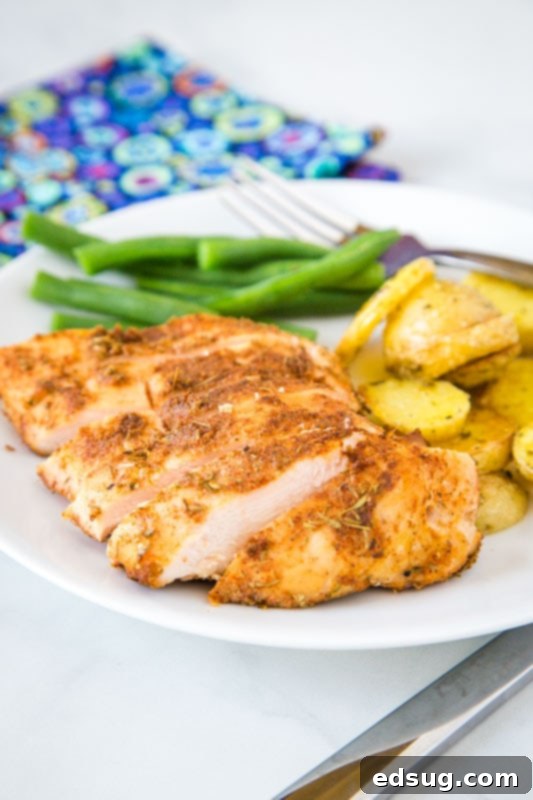 sliced chicken breast on white plate