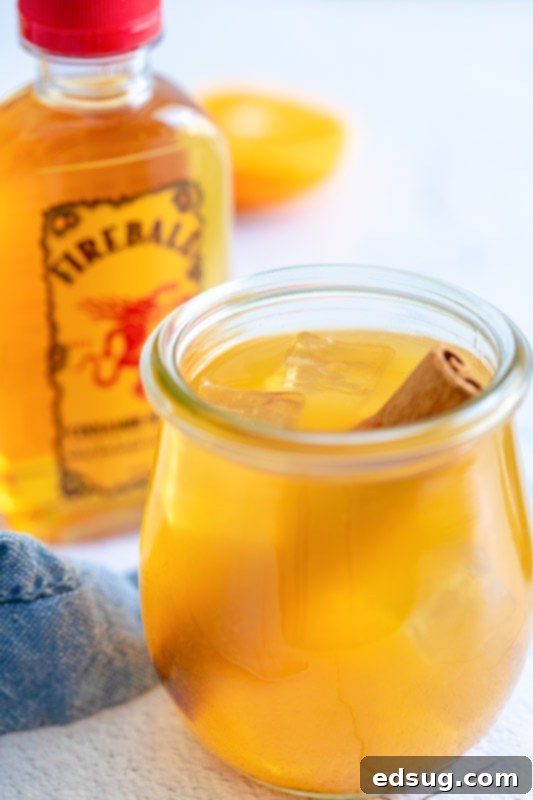 close up of apple cider cocktail in a glass