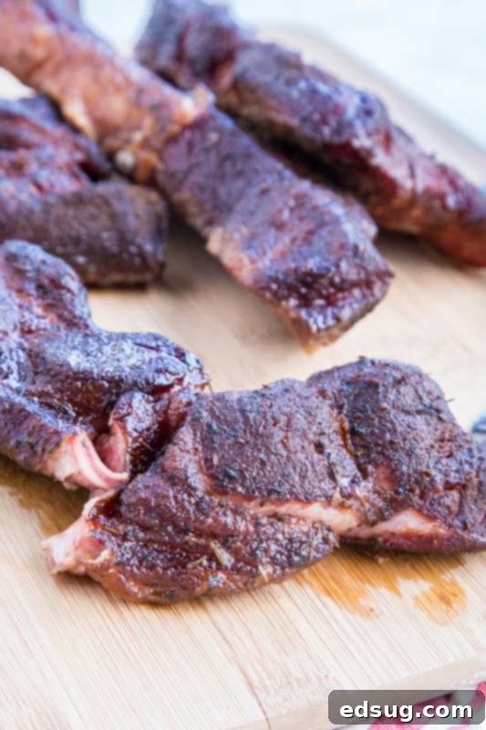 cooked country style ribs on cutting board