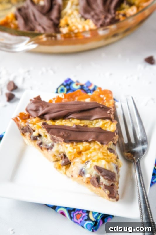 samoa cookie pie on a plate with a fork ready to be enjoyed