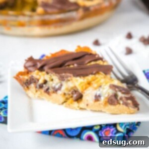 Samoa Cookie Pie - The classic Girl Scout Samoa Cookies in the form of a pie! Butter cookie crust topped with chocolate, caramel and toasted coconut.