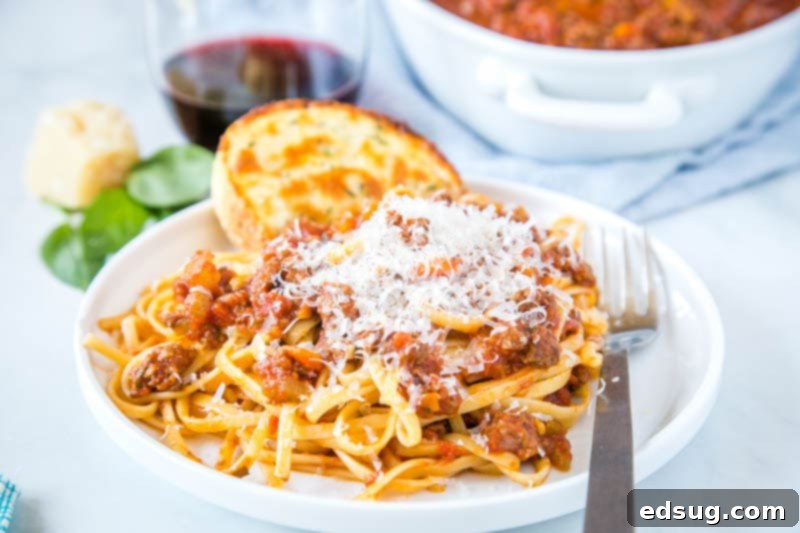 Quick Instant Pot Bolognese 4 Instant Pot Bolognese - a close-up of the rich, thick sauce simmering, demonstrating its readiness and robust texture.