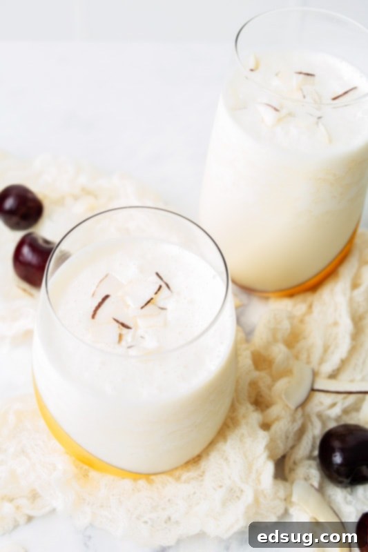 Liquid Sunshine 3 Glasses filled with Pina Coladas on a table, ready to be served