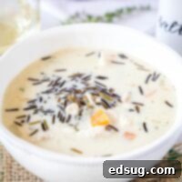 close up wild rice soup in a white bowl